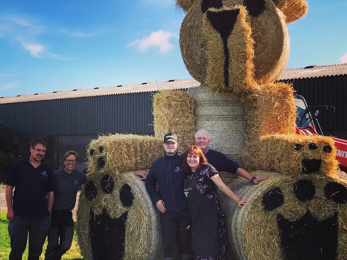 Farm family with bale bear